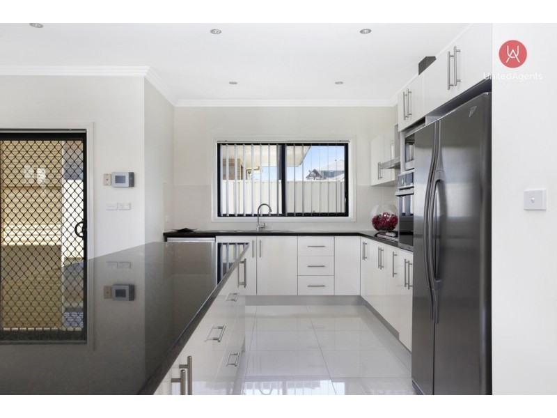 6 Laurieton Road, Carnes Hill NSW 2171