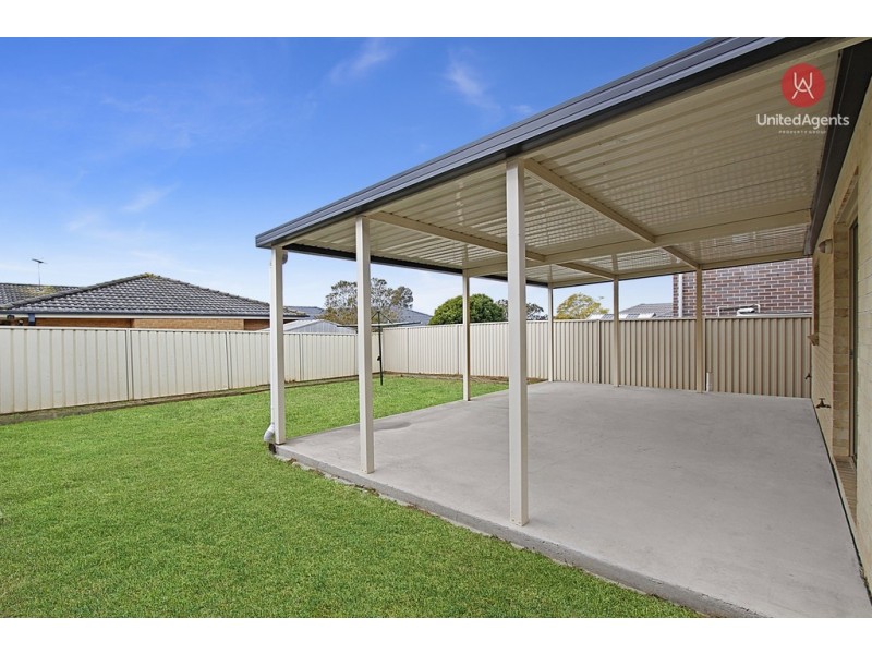 45 Pacific Palms Circuit, Carnes Hill NSW 2171