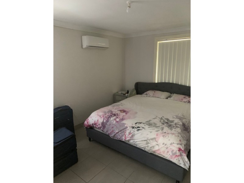 45 Cartwright Ave, Busby NSW 2168