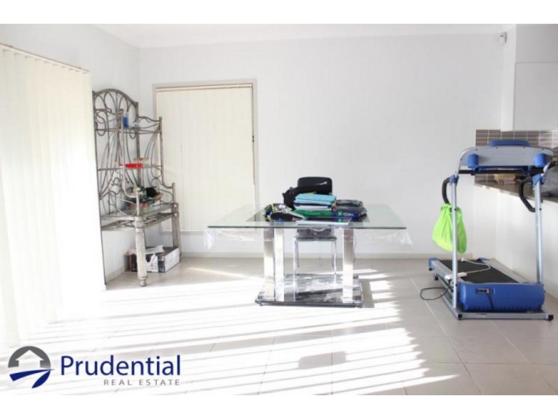 8 Gilchrist Drive, Campbelltown NSW 2560