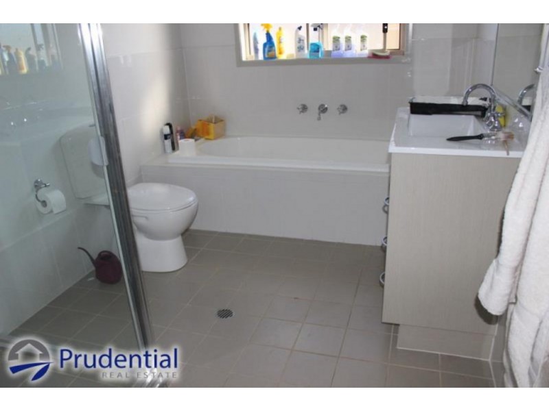 8 Gilchrist Drive, Campbelltown NSW 2560