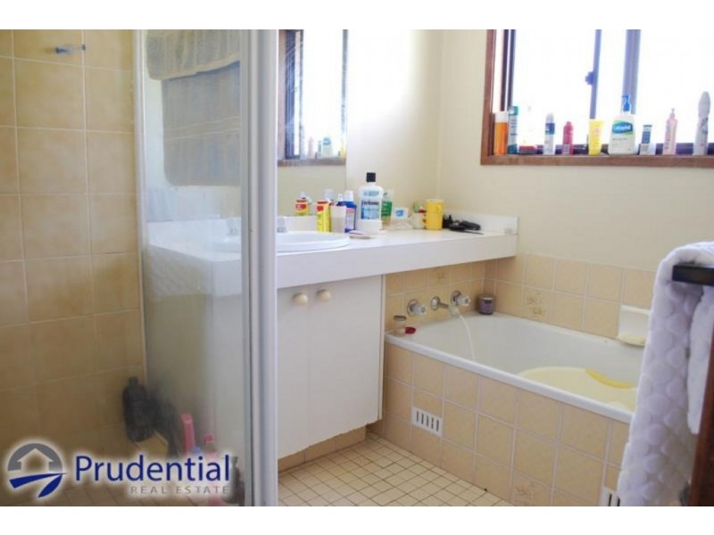 15 Cuscus Place, St Helens Park NSW 2560