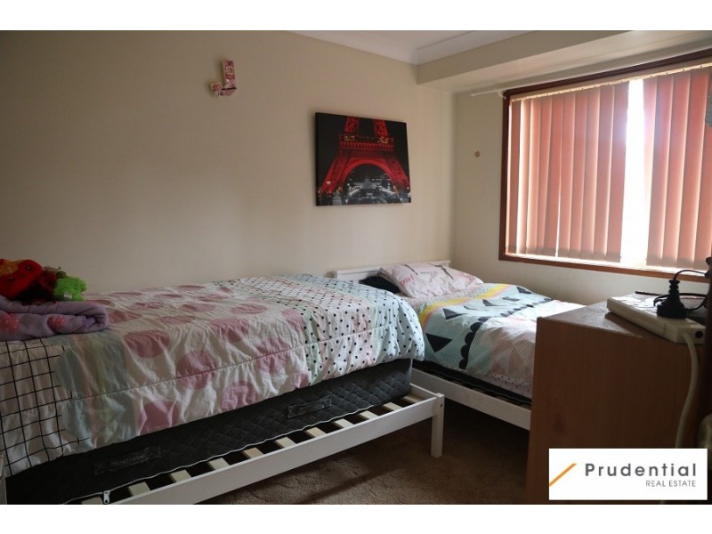63 Carbasse Crescent, St Helens Park NSW 2560