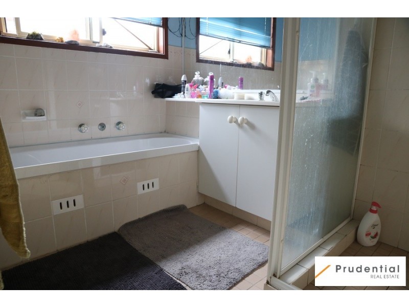 63 Carbasse Crescent, St Helens Park NSW 2560