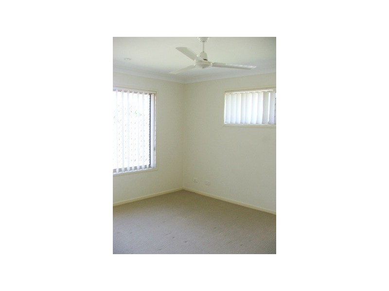 9 Taske Rise, Pacific Pines QLD 4211