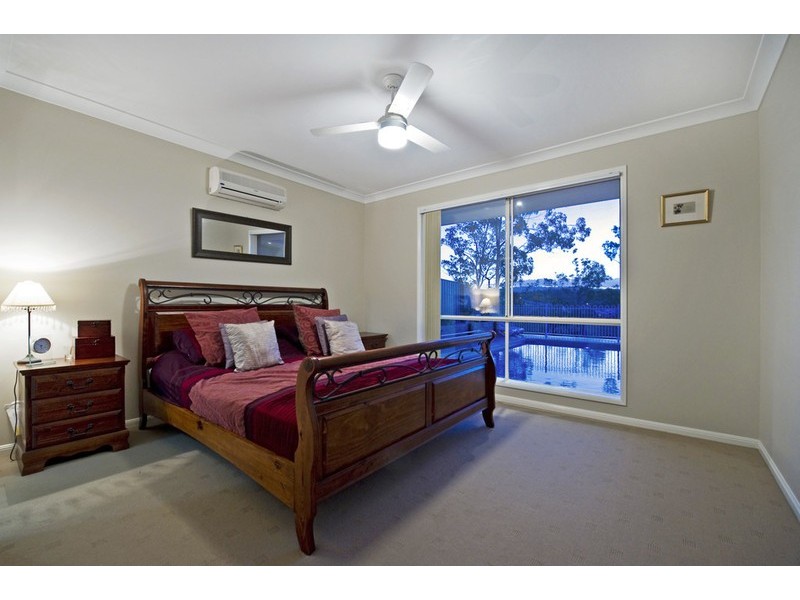 52 Harmsworth Road, Pacific Pines QLD 4211