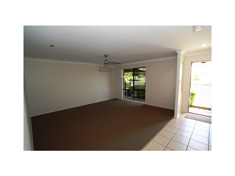 4 Springwood Avenue, Pacific Pines QLD 4211