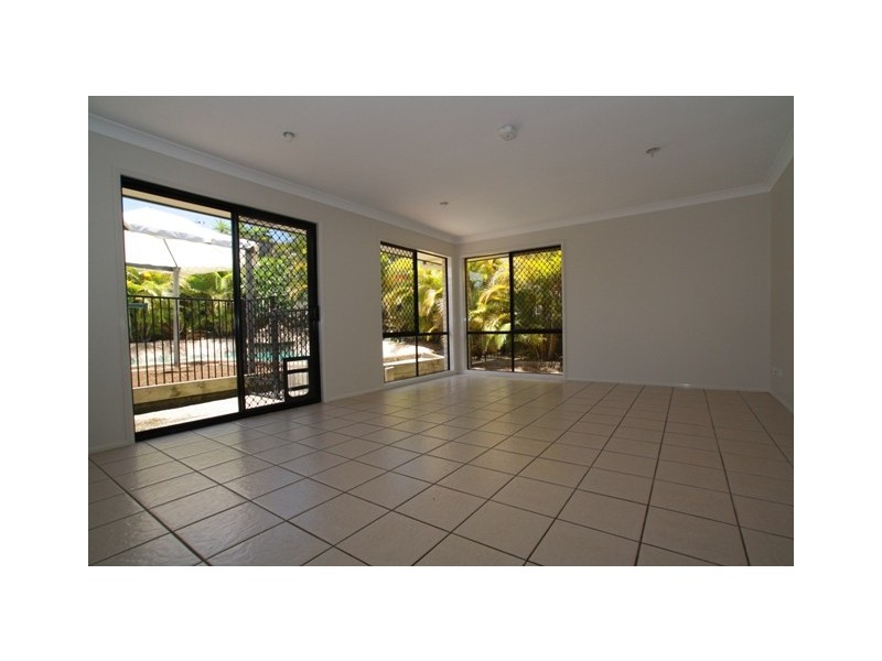 4 Springwood Avenue, Pacific Pines QLD 4211