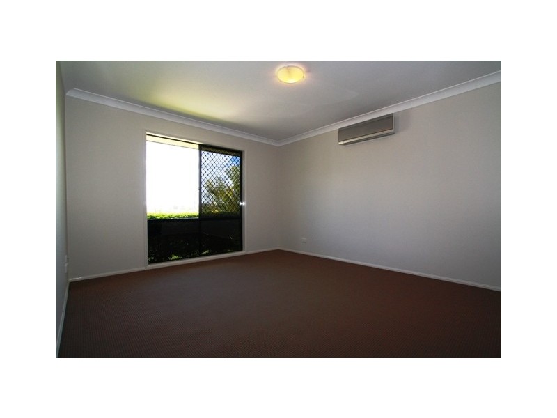 4 Springwood Avenue, Pacific Pines QLD 4211