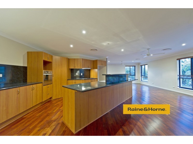 15 Springwood Ave, Pacific Pines QLD 4211