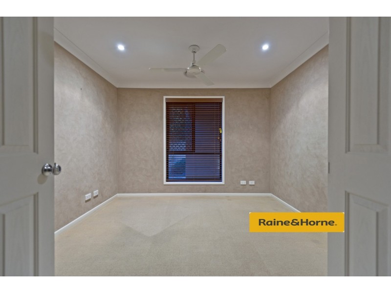 15 Springwood Ave, Pacific Pines QLD 4211