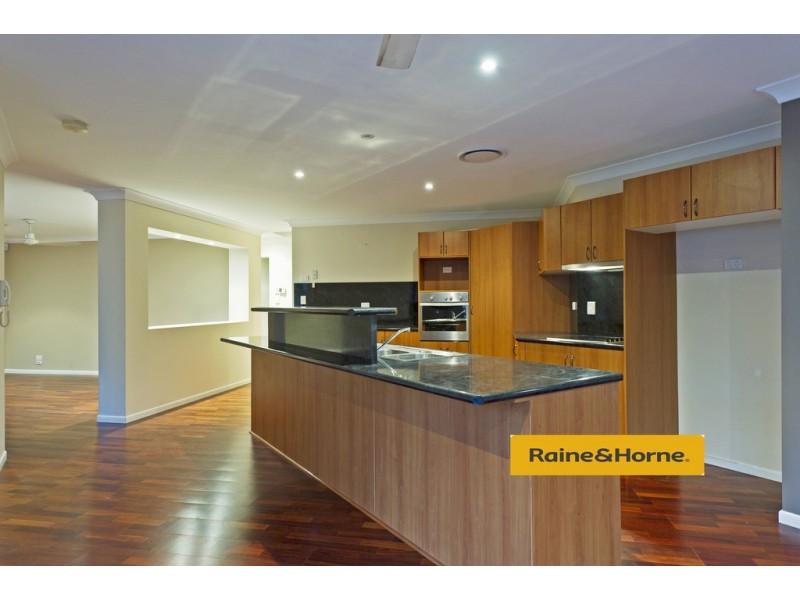 15 Springwood Ave, Pacific Pines QLD 4211