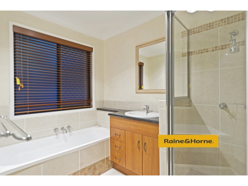 15 Springwood Ave, Pacific Pines QLD 4211
