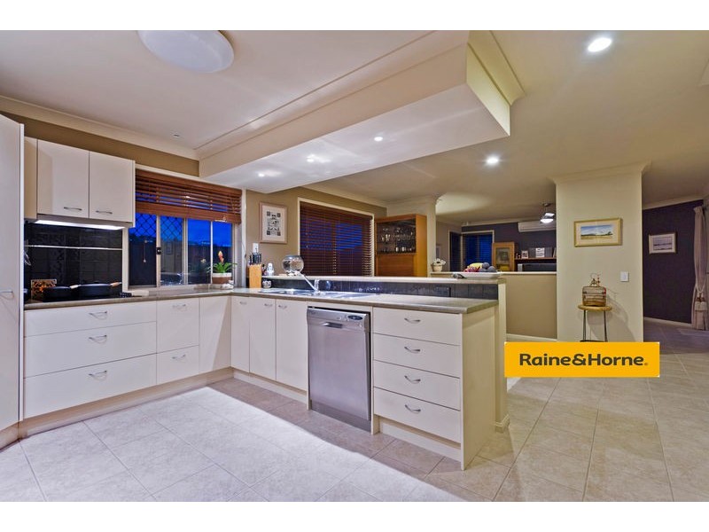 6 Springwood Avenue, Pacific Pines QLD 4211