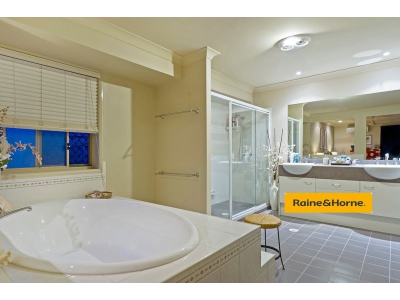 6 Springwood Avenue, Pacific Pines QLD 4211