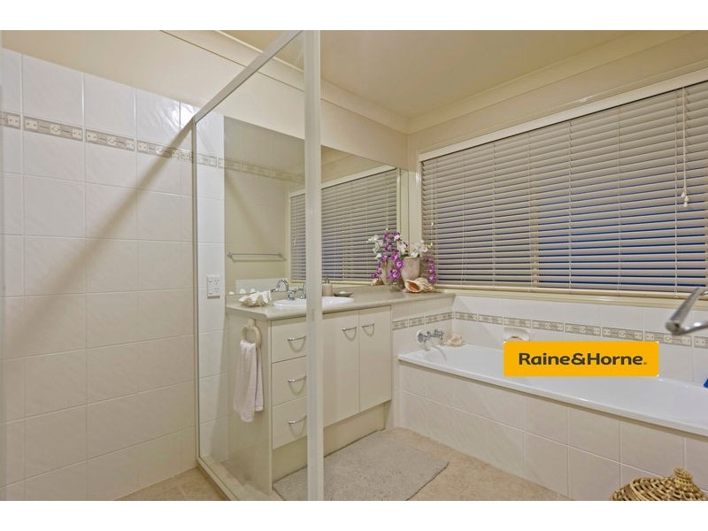 6 Springwood Avenue, Pacific Pines QLD 4211