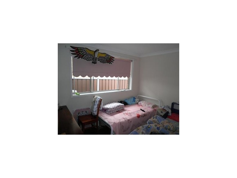 54 First Avenue, Macquarie Fields NSW 2564