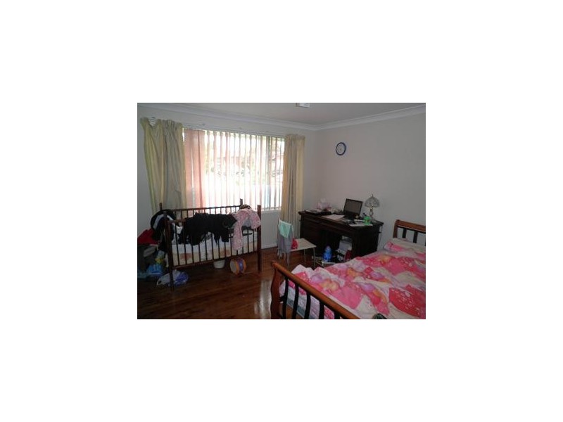 54 First Avenue, Macquarie Fields NSW 2564