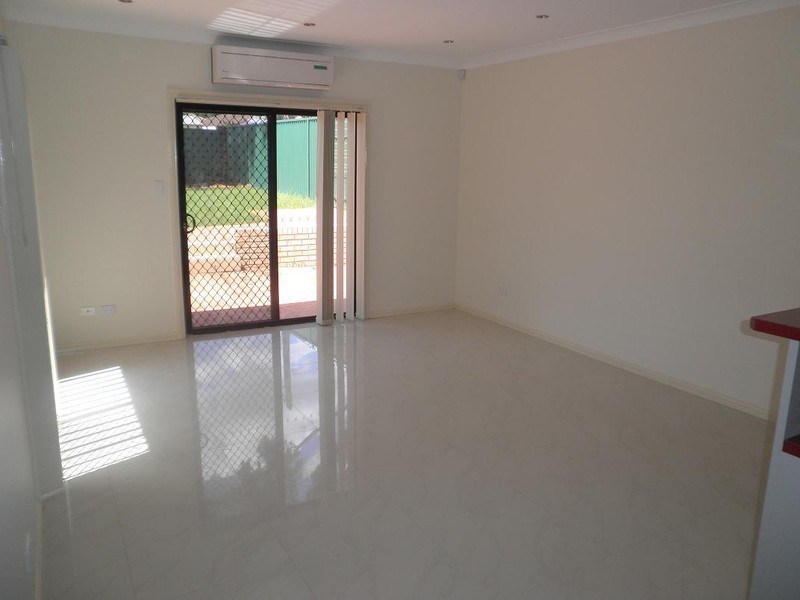 54 Pelargonium Crescent, Macquarie Fields NSW 2564