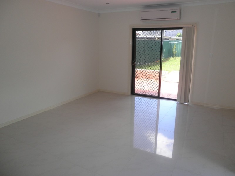 56 Pelargonium Crescent, Macquarie Fields NSW 2564