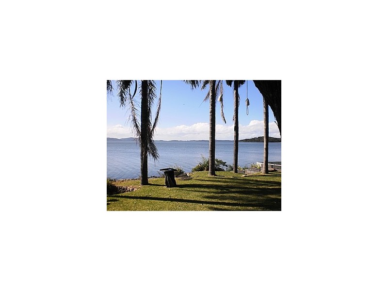 65 Caswell Crescent, Tanilba Bay NSW 2319
