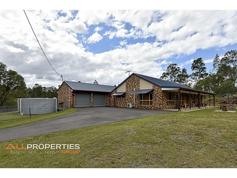 98 Canterbury Dr, Mundoolun QLD 4285