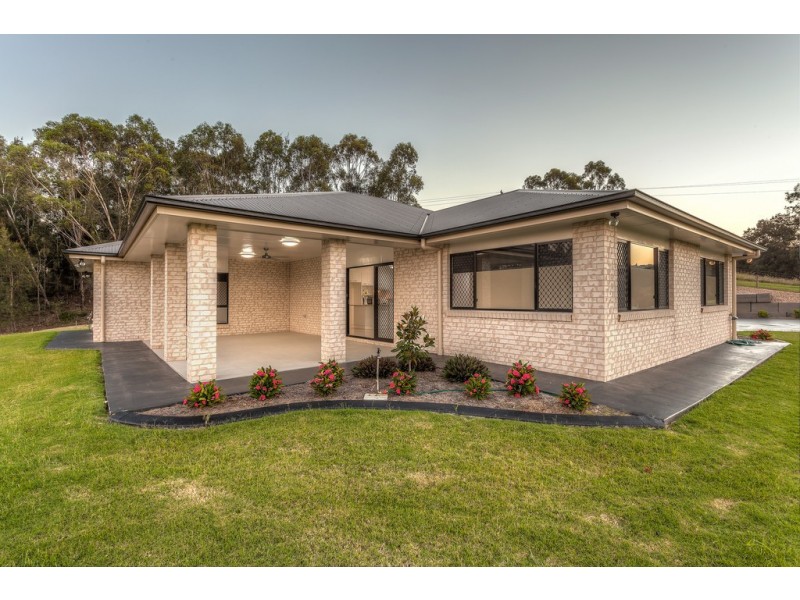 15 Dolleys Road, Withcott QLD 4352