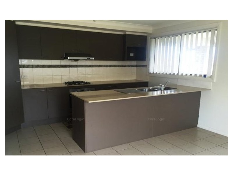 1 Stonequarry Way, Carnes Hill NSW 2171