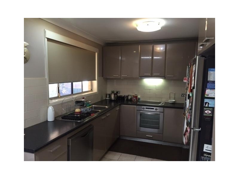 15 Wentworth Ave, Glenfield NSW 2167