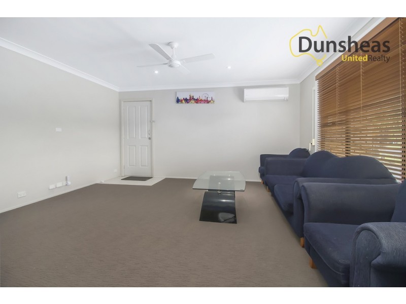 31 Adrian Street, Macquarie Fields NSW 2564