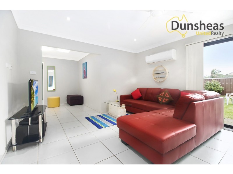 31 Adrian Street, Macquarie Fields NSW 2564