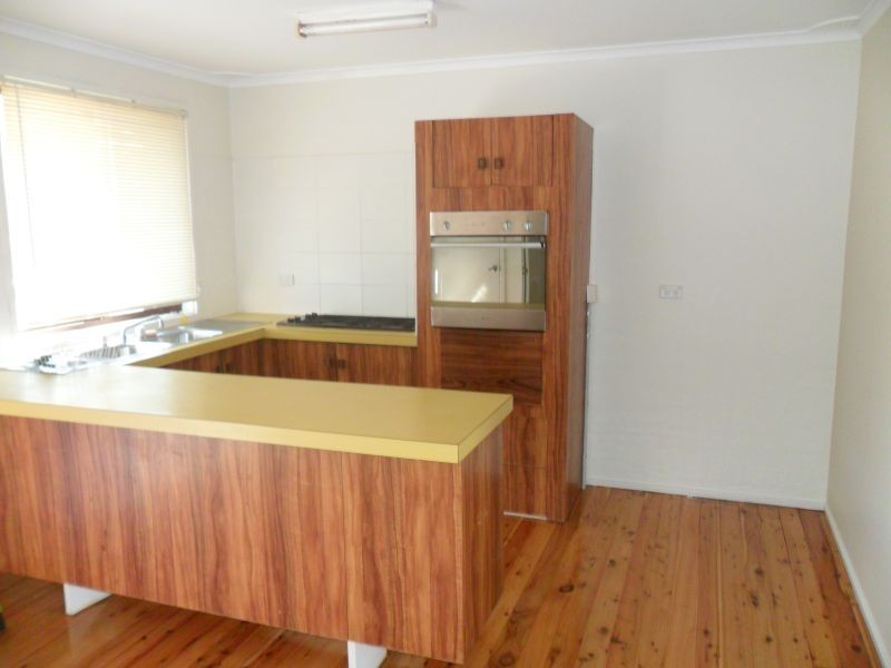 7 Buttercup Street, Macquarie Fields NSW 2564