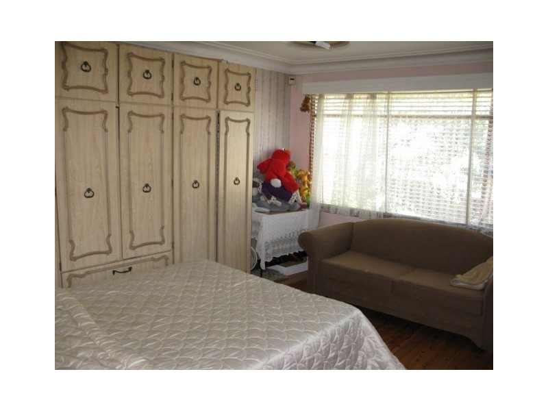 2 First Ave, Macquarie Fields NSW 2564