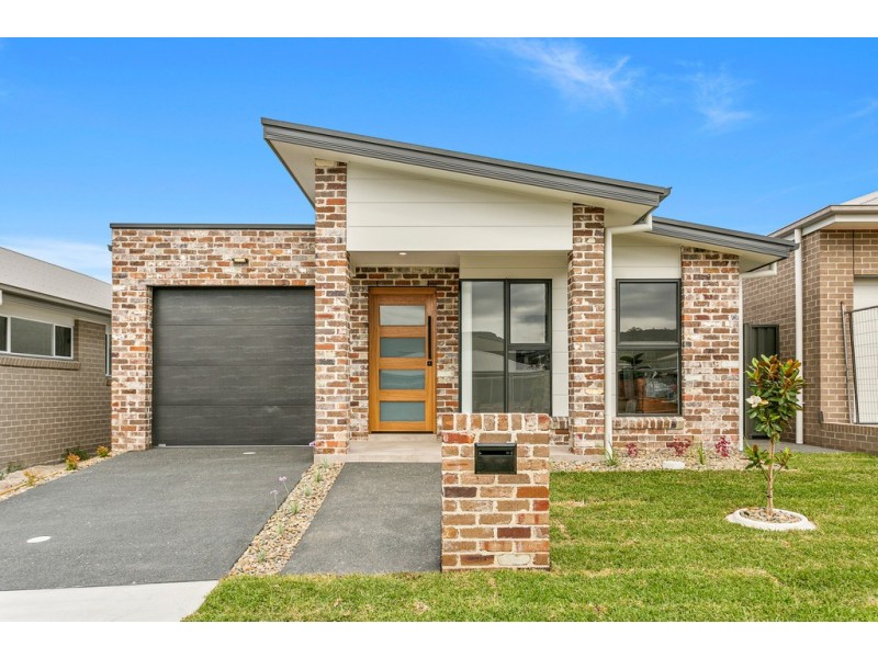 54 Wildflower Crescent, Calderwood NSW 2527