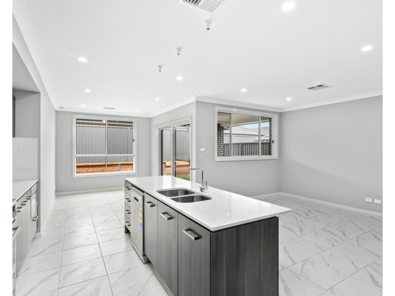 11 Sarsaparilla Way, Calderwood NSW 2527