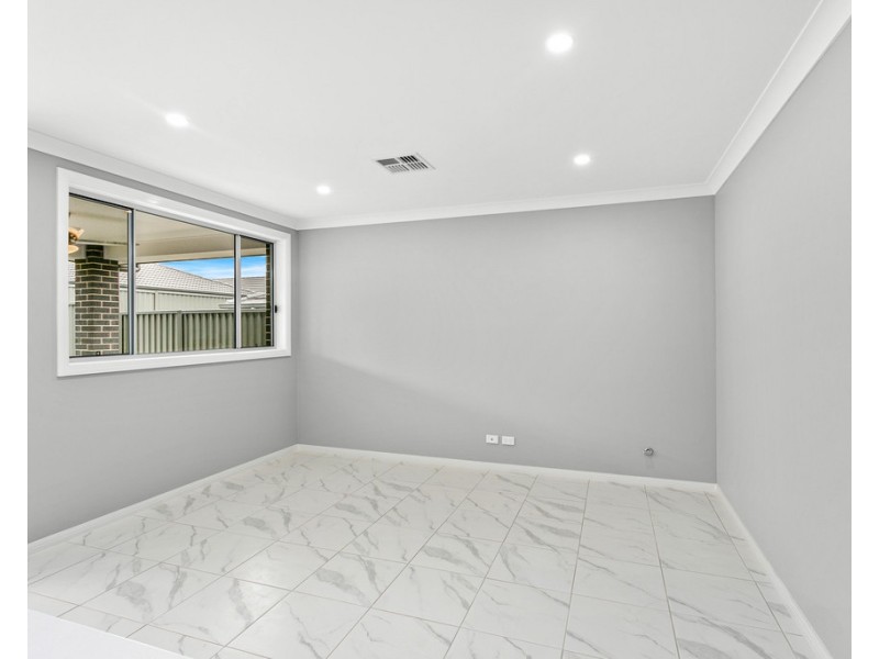 11 Sarsaparilla Way, Calderwood NSW 2527