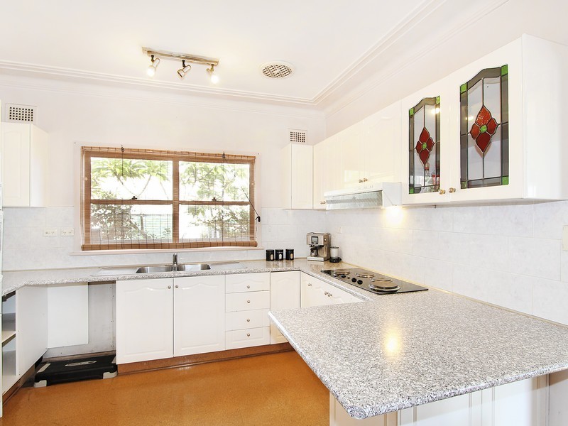 212 Henry Lawson Drive, Georges Hall NSW 2198