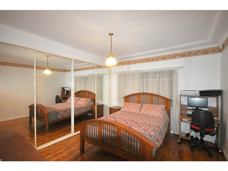 215 Henry Lawson Drive, Georges Hall NSW 2198