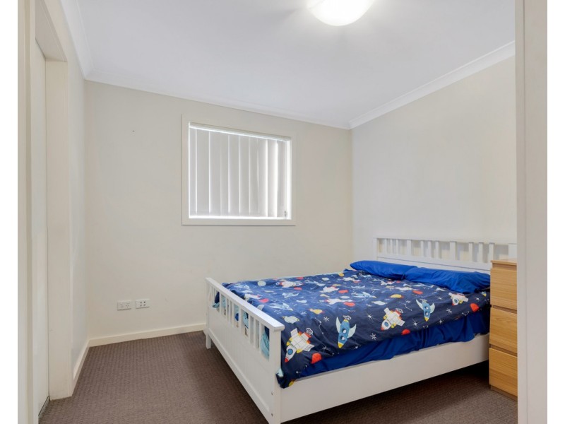 7 Hickory Place, Macquarie Fields NSW 2564