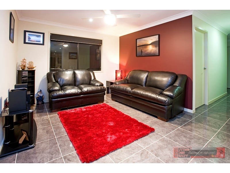 10 FARADAY PL, Pacific Pines QLD 4211