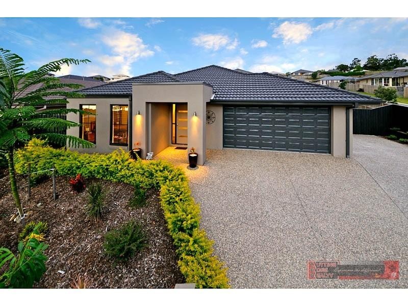 10 FARADAY PL, Pacific Pines QLD 4211
