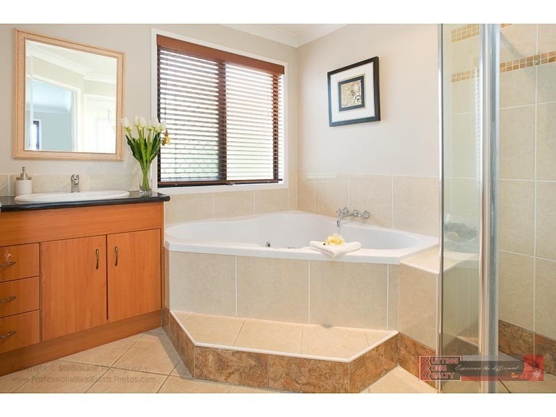 15 Springwood Ave, Pacific Pines QLD 4211