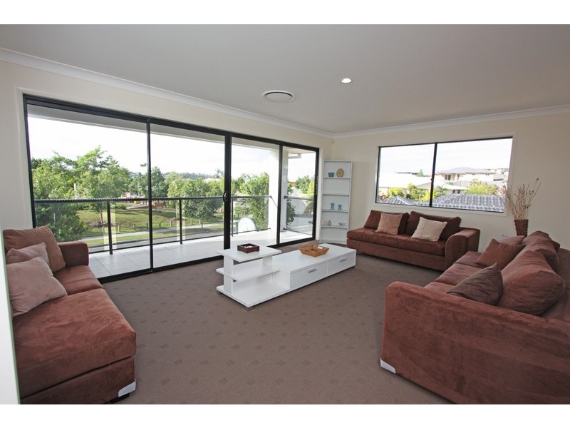 57 LAUGHLEN CHASE, Pacific Pines QLD 4211