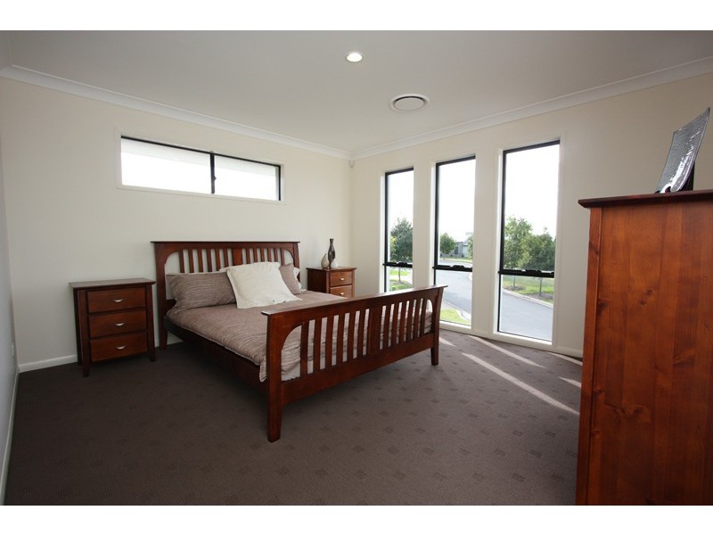 57 LAUGHLEN CHASE, Pacific Pines QLD 4211