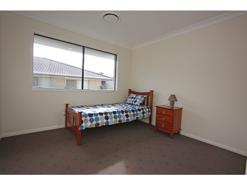 57 LAUGHLEN CHASE, Pacific Pines QLD 4211