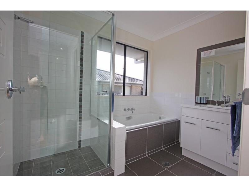 57 LAUGHLEN CHASE, Pacific Pines QLD 4211