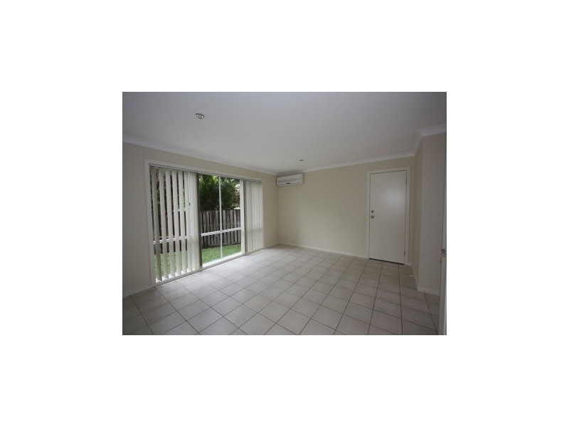 1 RIDGEWOOD CL, Pacific Pines QLD 4211