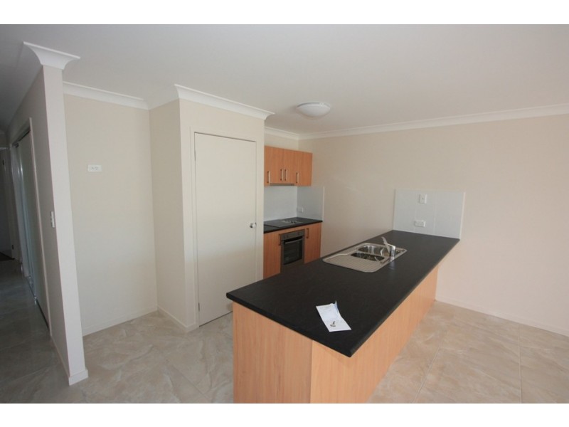 82 Wunburra Circle, Pacific Pines QLD 4211