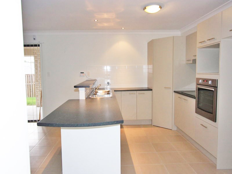 38 Faraday Cres, Pacific Pines QLD 4211