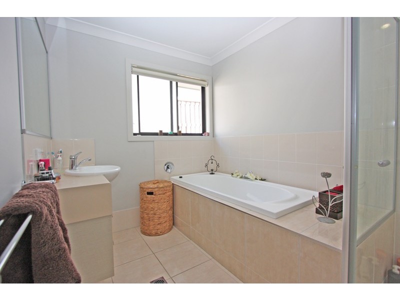 9 Morning Sun Ct, Maudsland QLD 4210